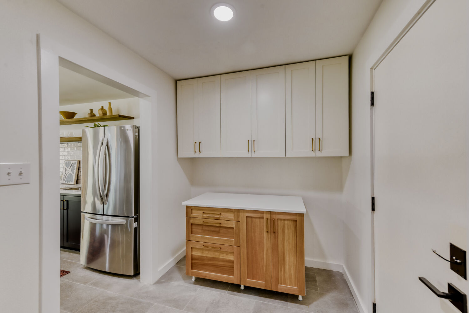 6108 Bridlington Circle Austin, TX 78745 - Photo 18 of 22 a kitchen with refrigerator and cabinets