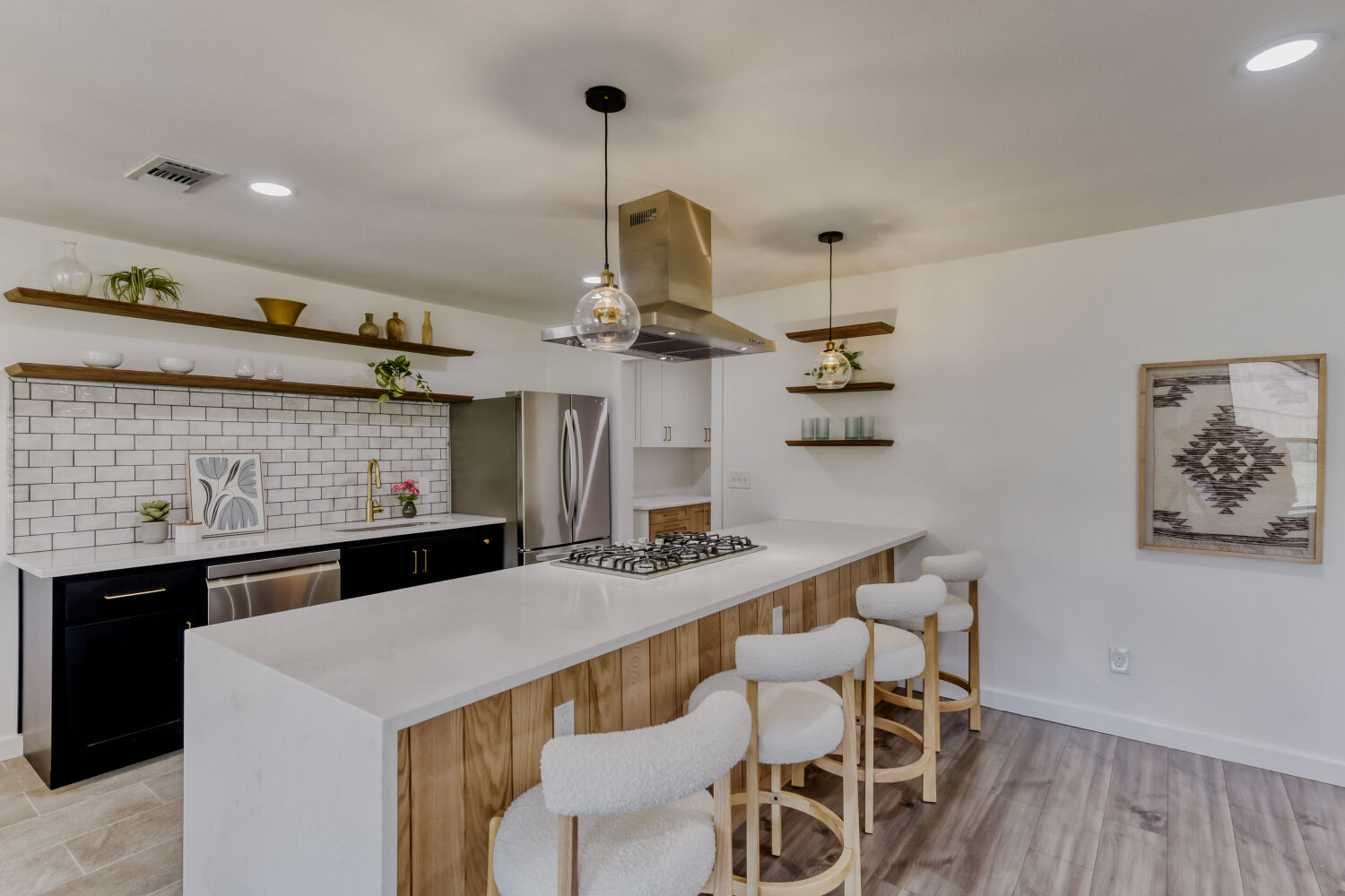 6108 Bridlington Circle Austin, TX 78745 - Photo 5 of 22 a kitchen with a table and chairs