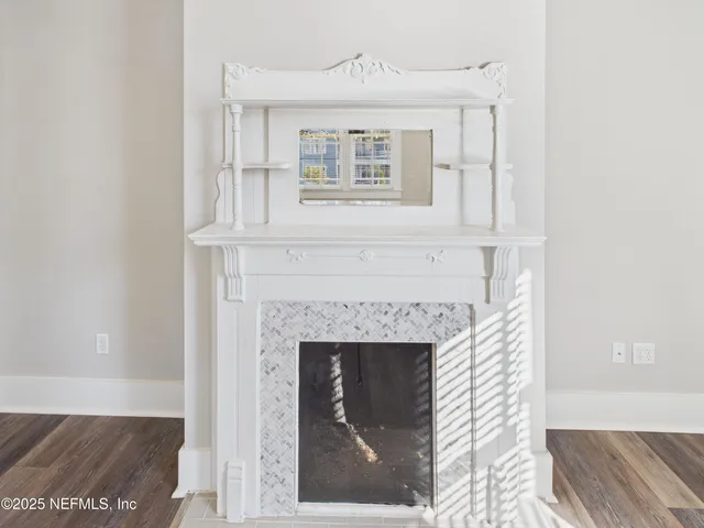 a front view of a house with white walls
