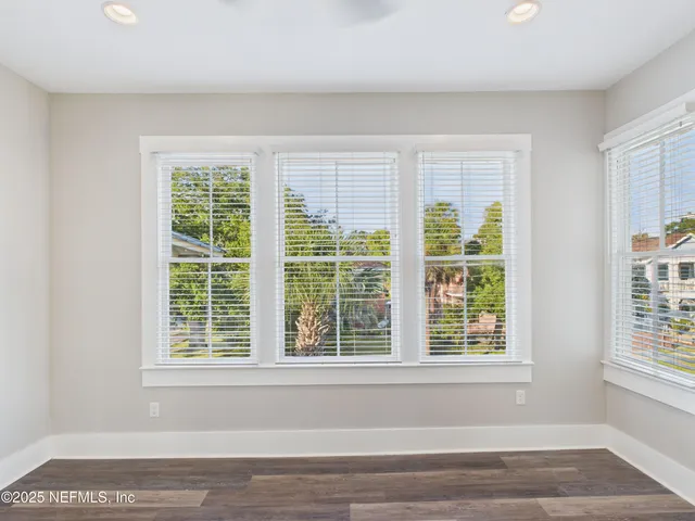 a view of a room with a large window