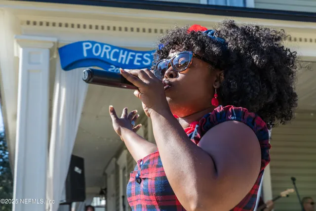 a view of a brick building with a large window