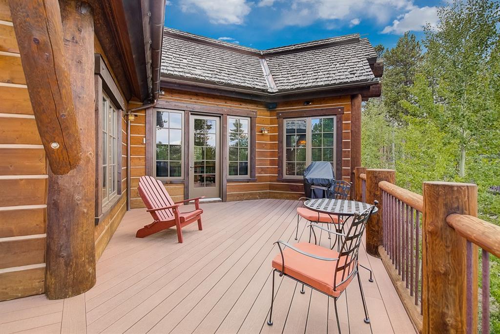 350 Timbertrail Road Breckenridge, CO 80424 - Photo 12 of 35 a view of a patio with a table and chairs