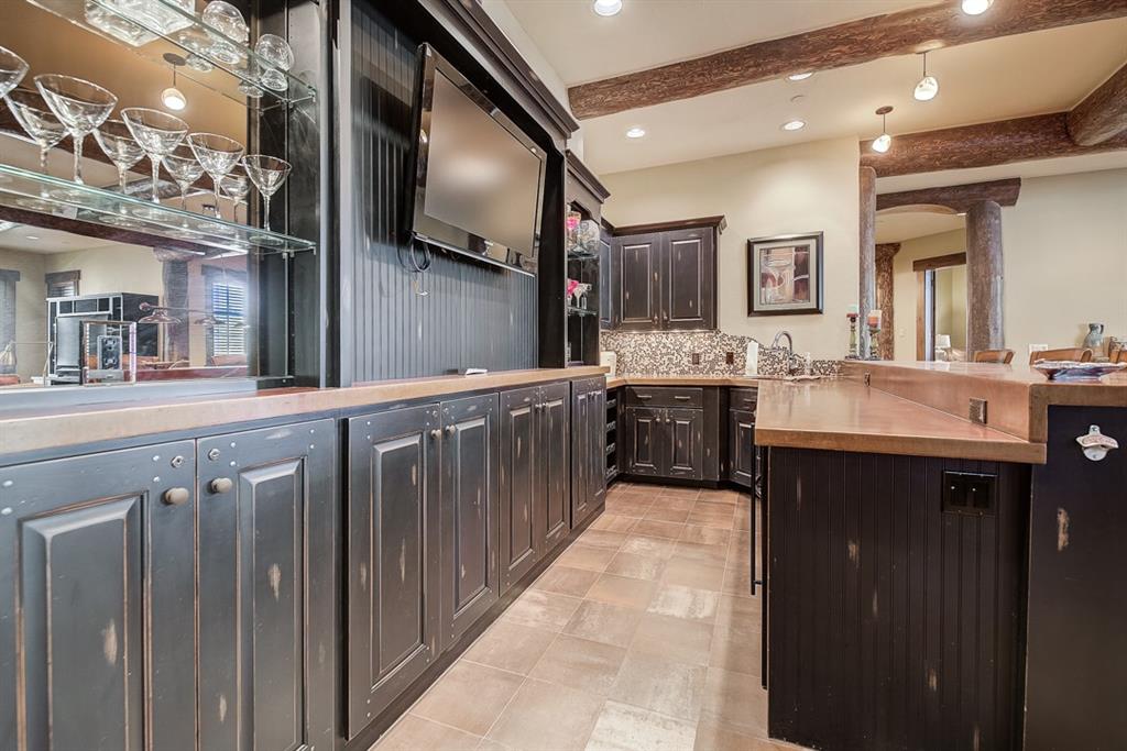350 Timbertrail Road Breckenridge, CO 80424 - Photo 24 of 35 a kitchen with cabinets and window