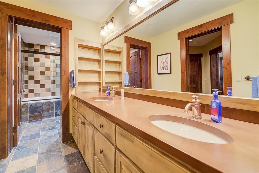350 Timbertrail Road Breckenridge, CO 80424 - Photo 30 of 35 a bathroom with double vanity sinks and a mirror