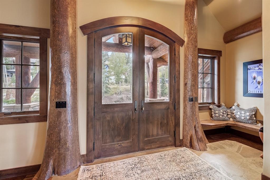 350 Timbertrail Road Breckenridge, CO 80424 - Photo 4 of 35 a bedroom with furniture and windows