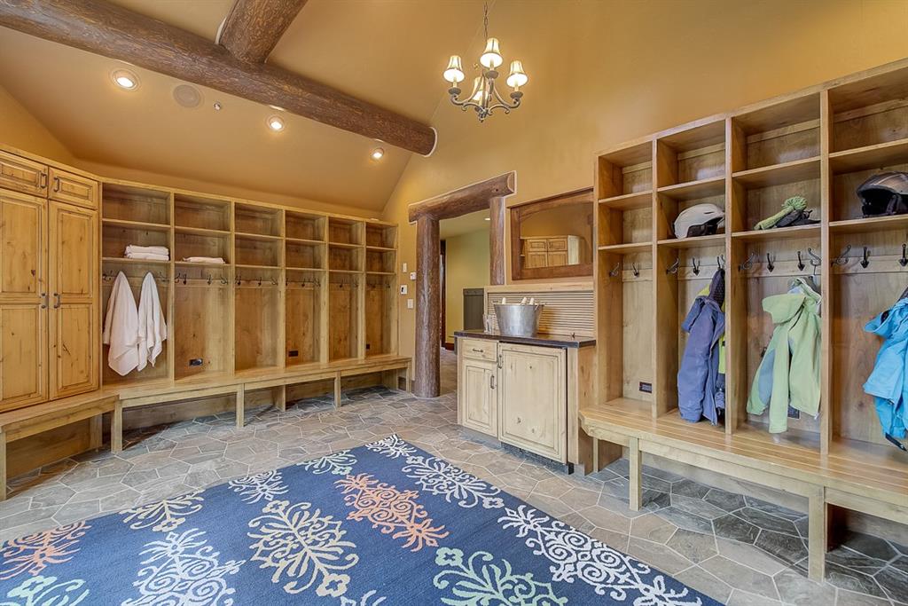 350 Timbertrail Road Breckenridge, CO 80424 - Photo 33 of 35 a view of walk in closet with clothes and shoes