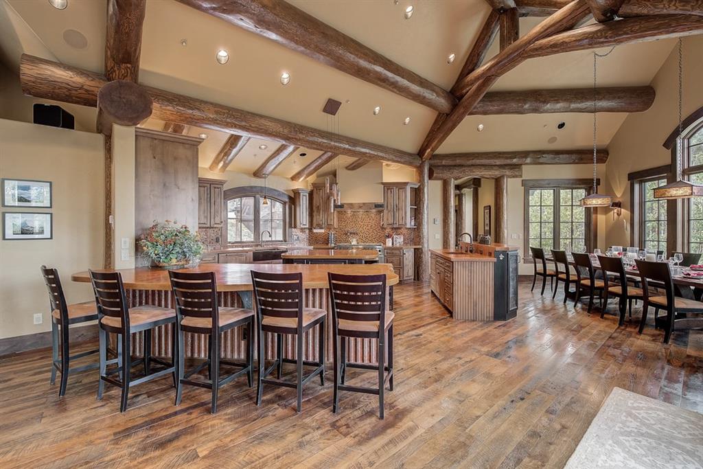 350 Timbertrail Road Breckenridge, CO 80424 - Photo 7 of 35 a view of a dining room with furniture and wooden floor