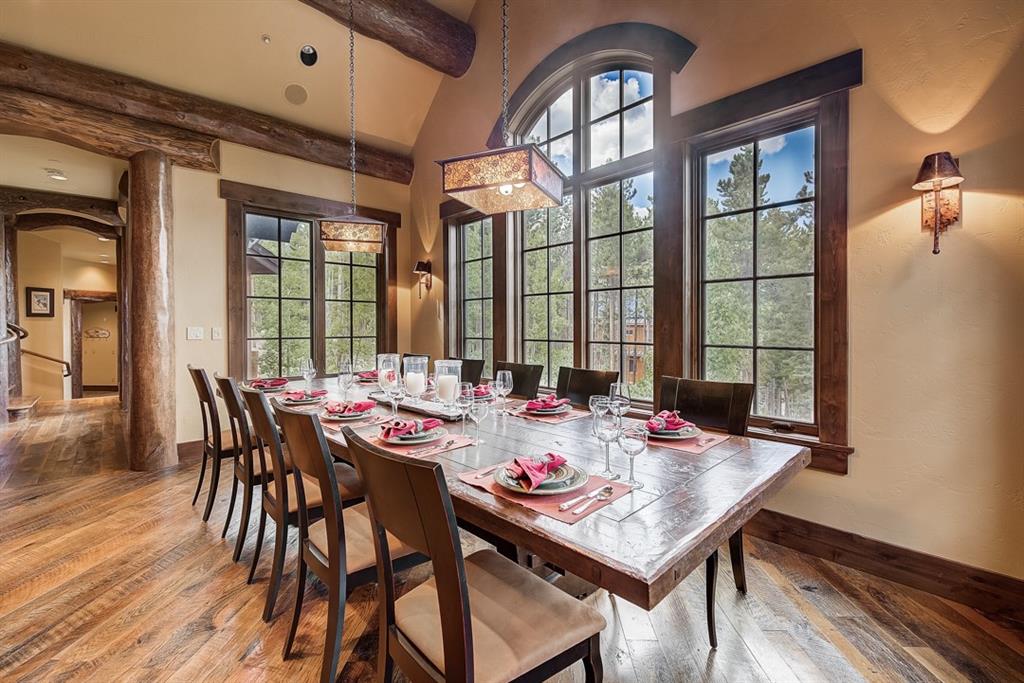 350 Timbertrail Road Breckenridge, CO 80424 - Photo 9 of 35 a view of a dining room with furniture window and wooden floor