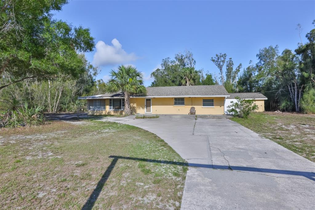 14451 Highland Road Wimauma, FL 33598 - Photo 71 of 80 a view of house with outdoor space