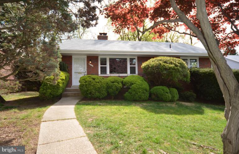 10105 Portland Place Silver Spring, MD 20901 - Photo 11 of 11 a view of a front of house with a yard