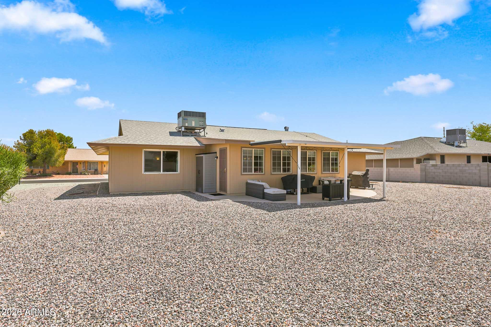 9810 West Blue Ridge Drive Sun City, AZ 85351 - Photo 27 of 29 Backyard Elevation