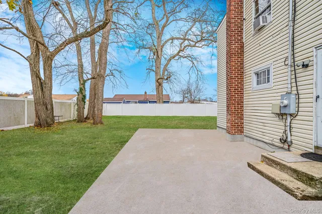 a view of backyard with green space