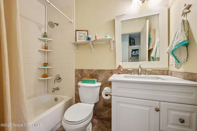 a bathroom with a sink a toilet and a bathtub