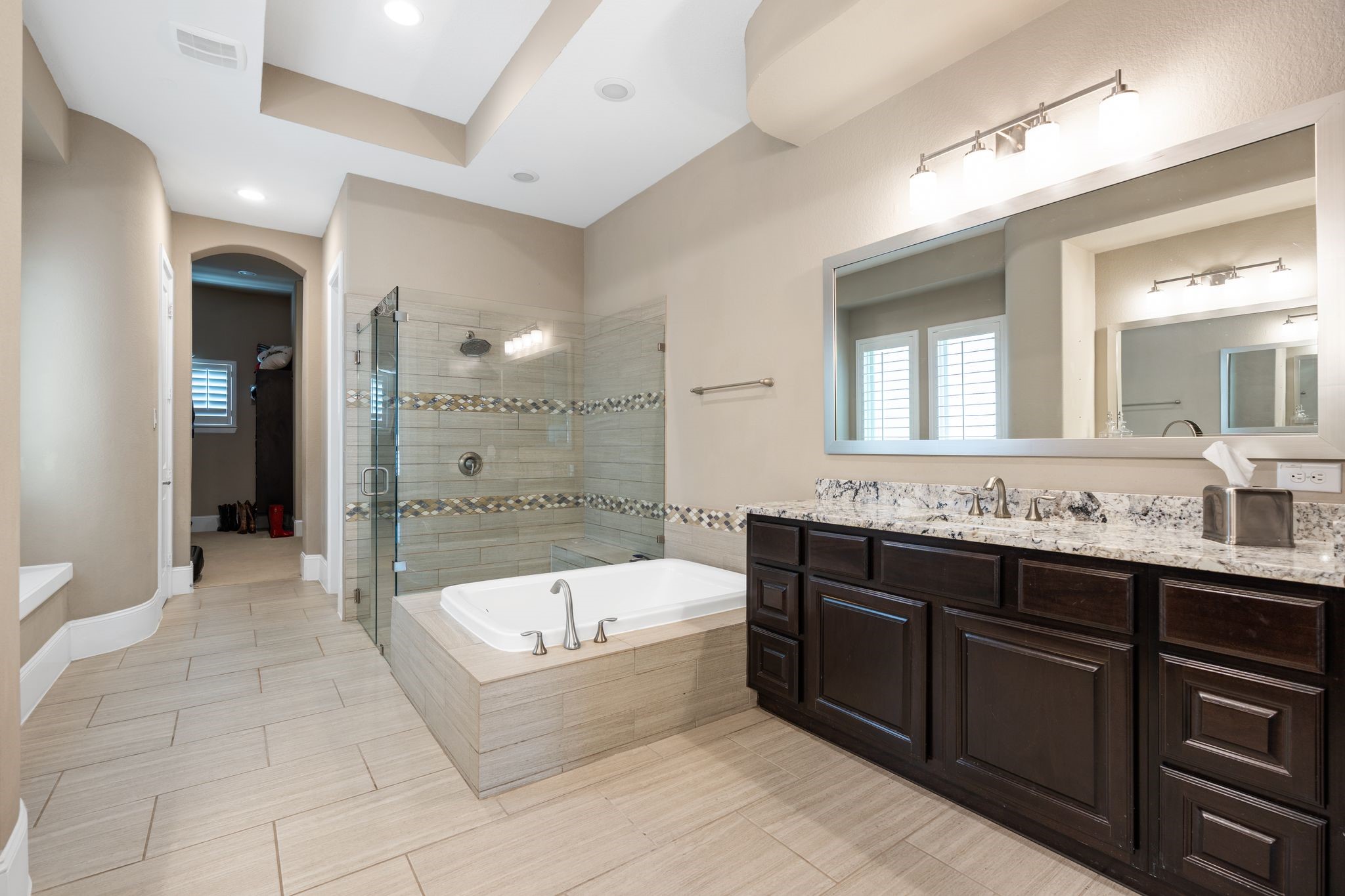2914 Rutherford Pl Court Katy, TX 77494 - Photo 29 of 50 a bathroom with a bathtub shower sink and mirror