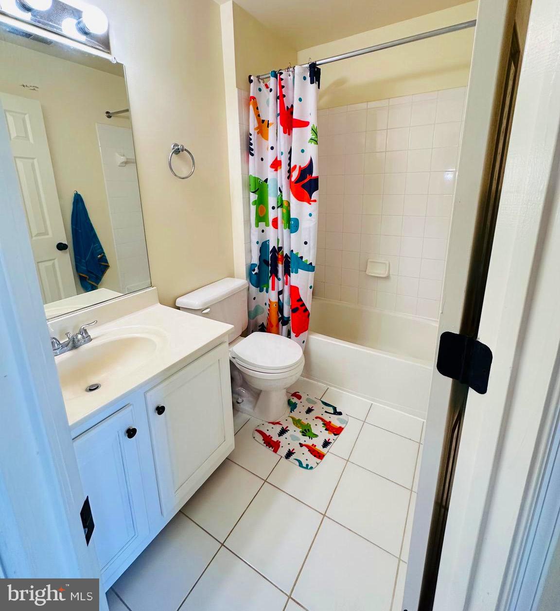 43005 Beachall Street Chantilly, VA 20152 - Photo 11 of 28 a bathroom with a sink vanity mirror and toilet