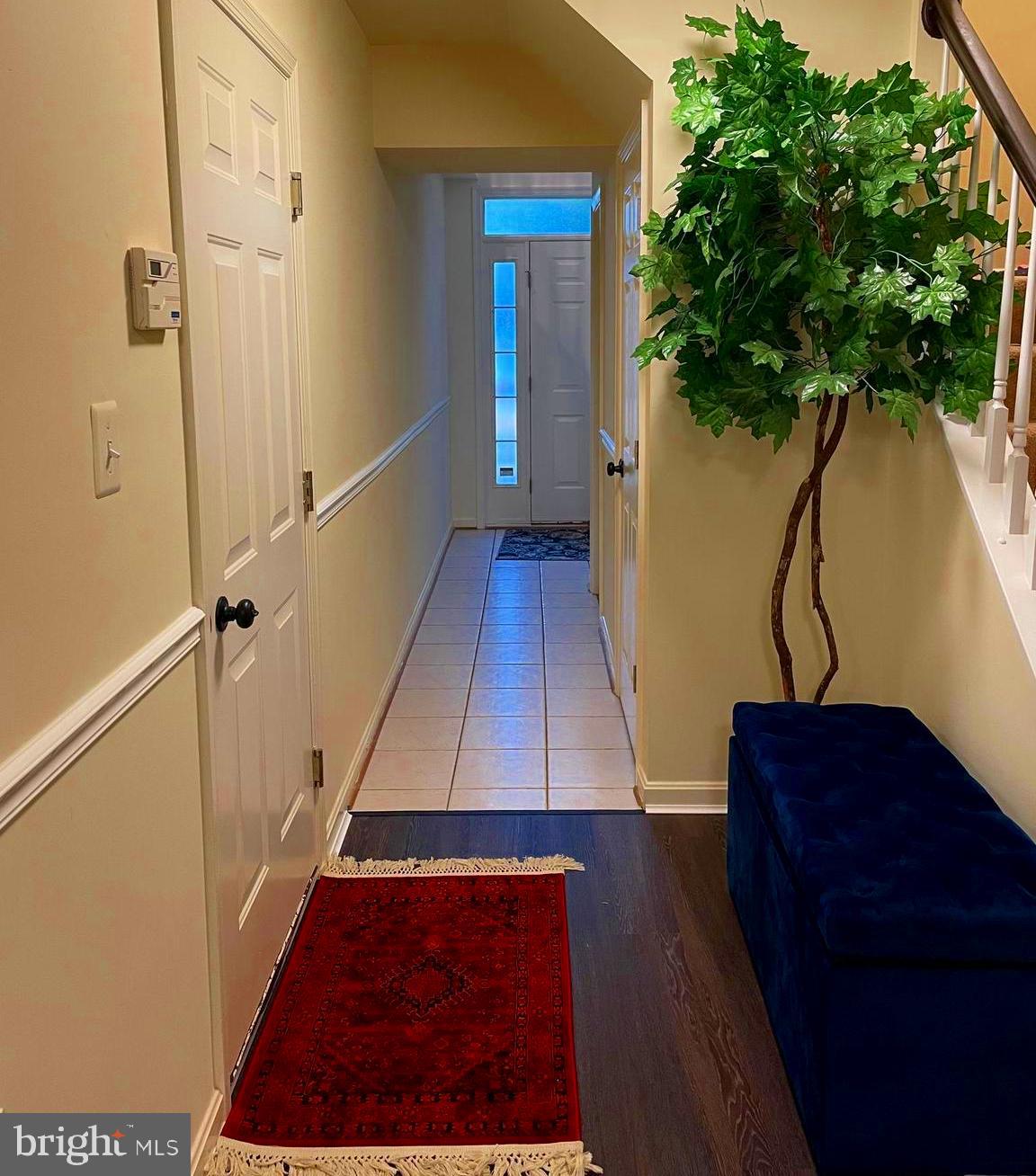 43005 Beachall Street Chantilly, VA 20152 - Photo 2 of 28 a view of entryway with wooden floor