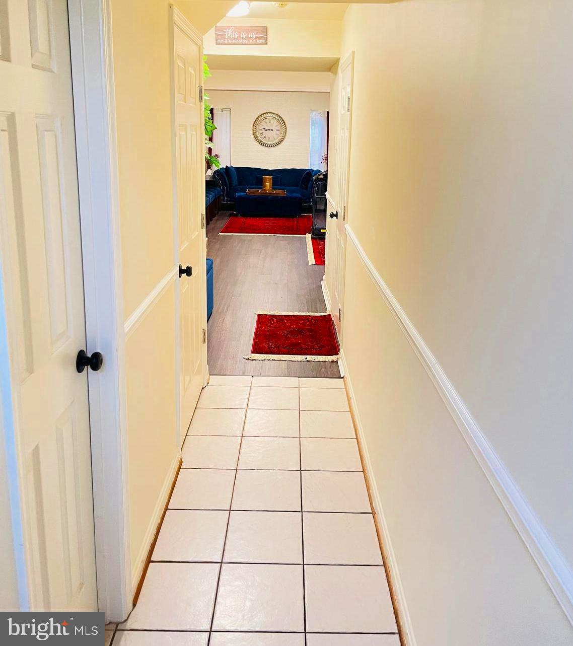 43005 Beachall Street Chantilly, VA 20152 - Photo 21 of 28 a hallway with washer and dryer