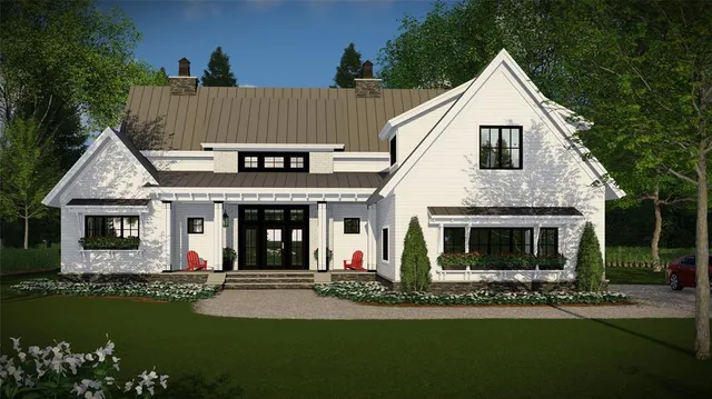 a front view of a house with a garden