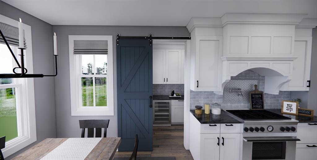 Tbd Tbd Tbd Spring Dripping Springs, TX 78620 - Photo 12 of 27 a kitchen with granite countertop a stove and a wooden cabinets