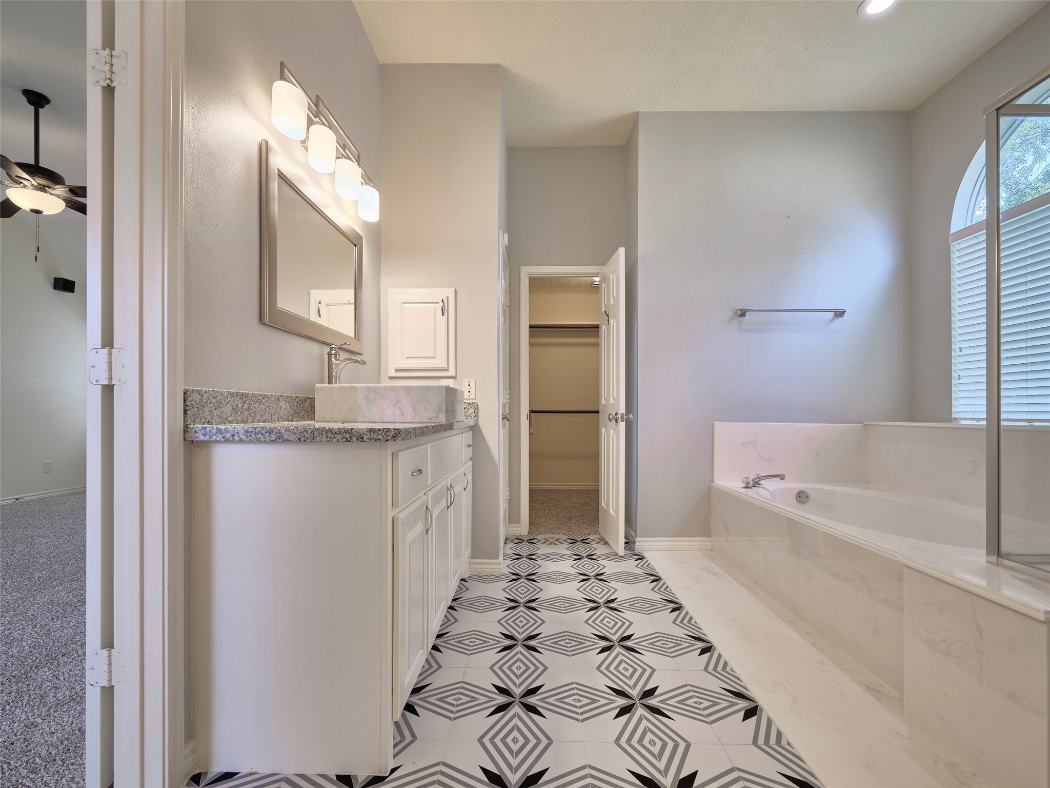 7626 Painton Lane Spring, TX 77389 - Photo 13 of 19 STANDING SHOWER AND LARGE TUB IN THE PRIMARY BATH