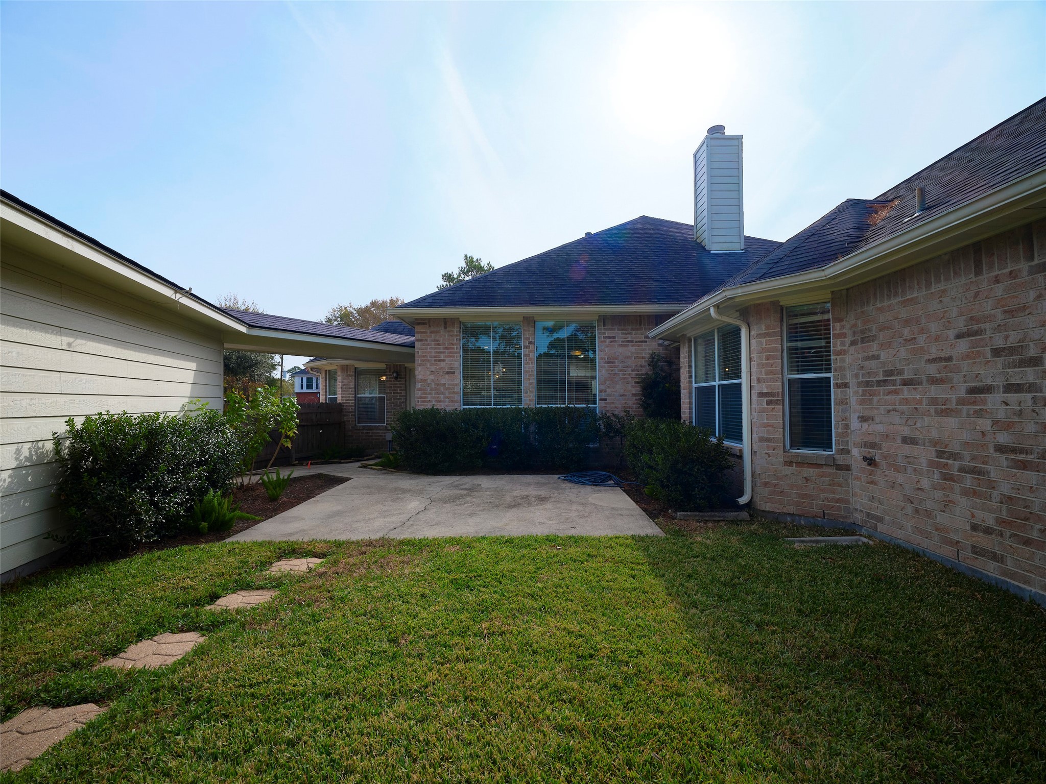 7626 Painton Lane Spring, TX 77389 - Photo 18 of 19 THE VAST BACK YARD WITH PAVERS AND DETAILED LANDSCAOING