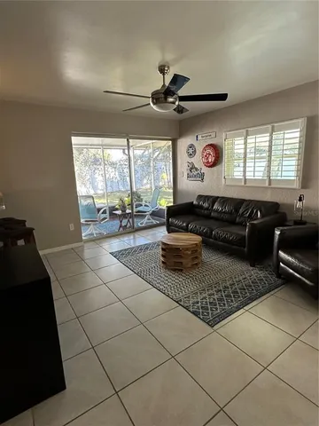 a lobby with furniture and window