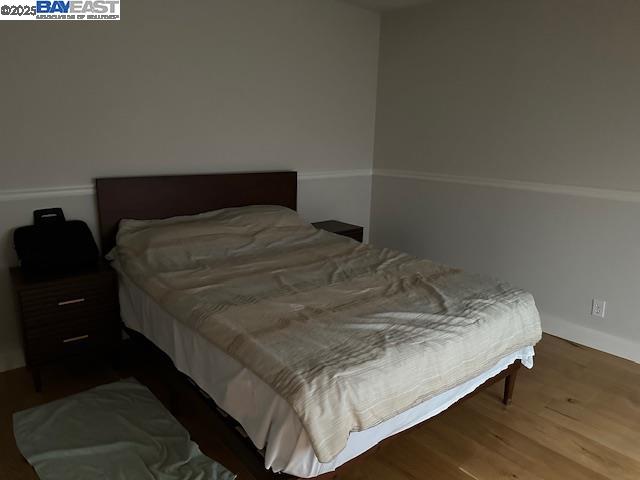 2744 Redbridge Road Tracy, CA 95377 - Photo 12 of 14 a bedroom with a bed and a night stand