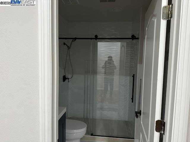 2744 Redbridge Road Tracy, CA 95377 - Photo 6 of 14 a bathroom with a shower and a toilet