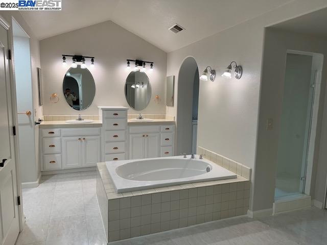 2744 Redbridge Road Tracy, CA 95377 - Photo 7 of 14 a bathroom with a tub sink and mirror