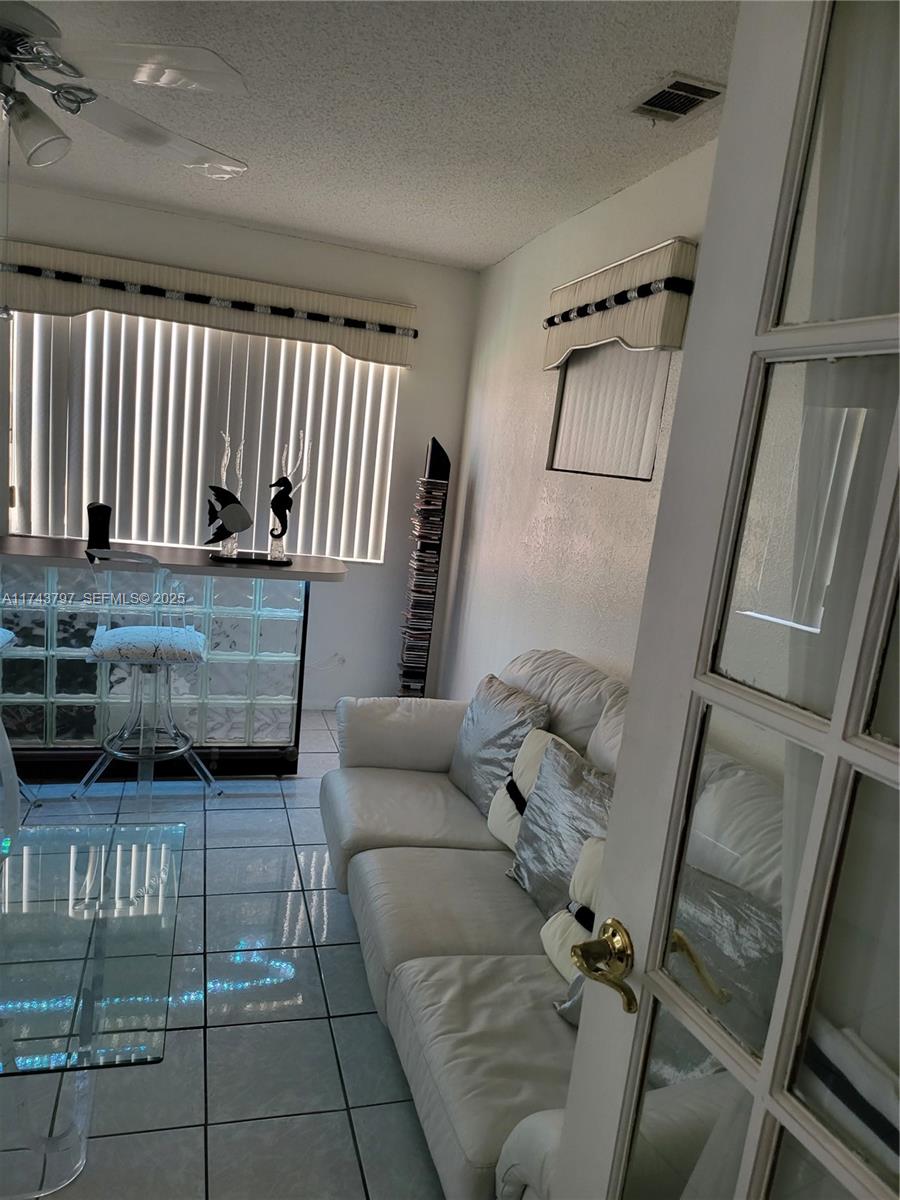 6771 Northwest 199th Terrace Hialeah, FL 33015 - Photo 37 of 42 a view of entryway and hall