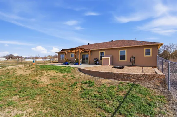 a front view of a house with outdoor space