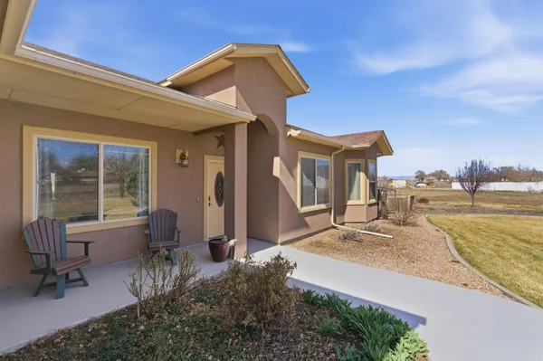 a view of house with outdoor space