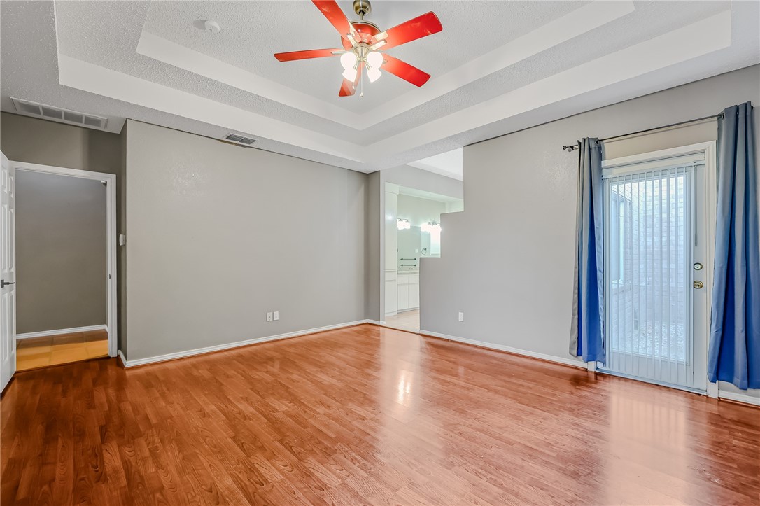 5917 Harvest Hill Road Corpus Christi, TX 78414 - Photo 23 of 40 a view of an empty room with wooden floor