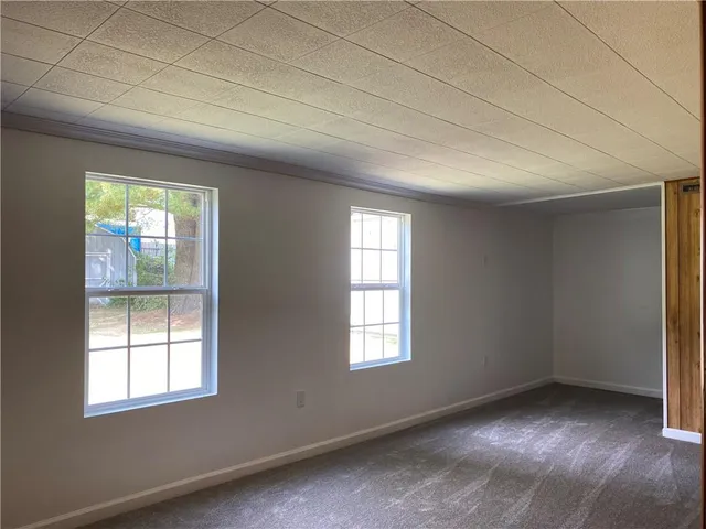 an empty room with windows