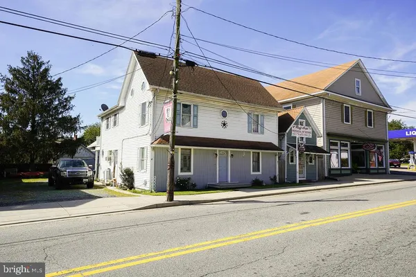 a view of a building with a street