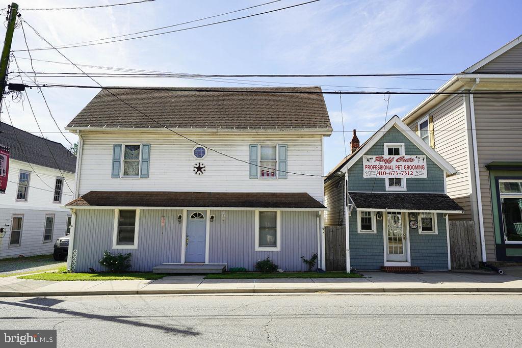 212 Main Street Preston, MD 21655 - Photo 3 of 56 a front view of a house with a yard