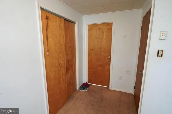 a bed room with a bed and a window