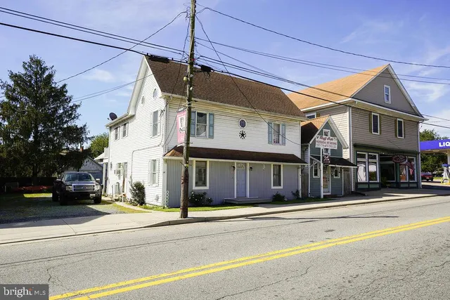 a view of a building with a street