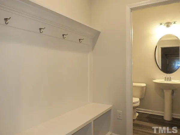 a bathroom with a toilet and a sink