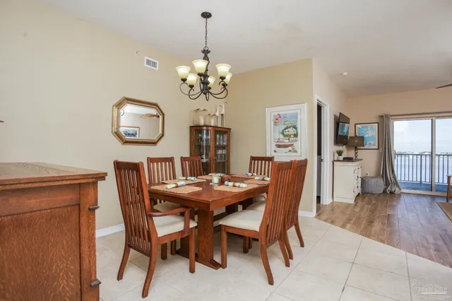a view of a dining room with furniture