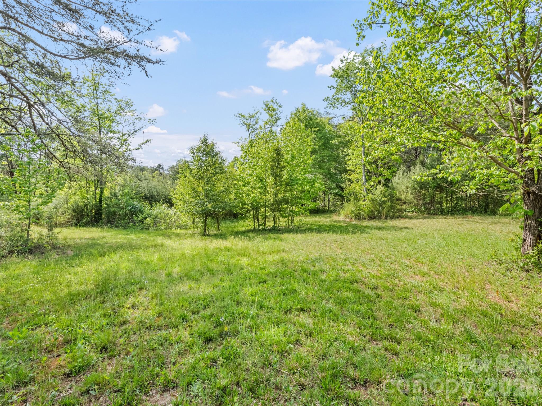 311 Soco Gap Road Ellenboro, NC 28040 - Photo 1 of 24 a view of outdoor space with deck and yard