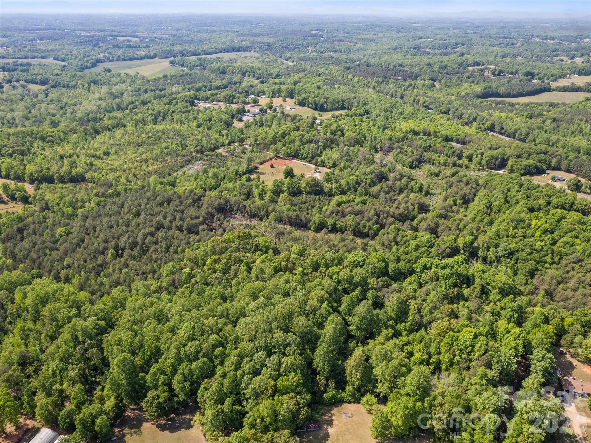 311 Soco Gap Road Ellenboro, NC 28040 - Photo 19 of 24 an aerial view of a house with a yard