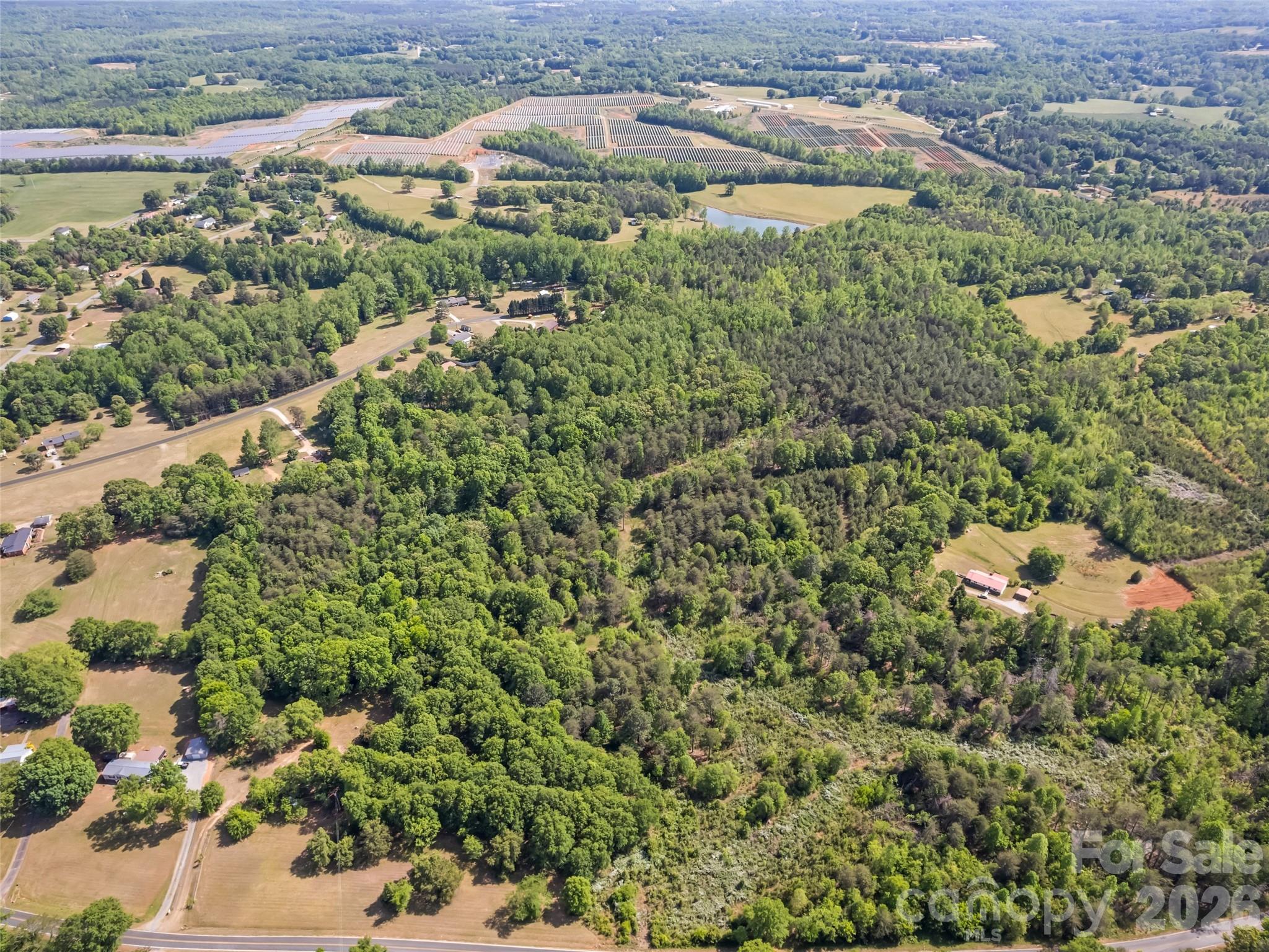 311 Soco Gap Road Ellenboro, NC 28040 - Photo 20 of 24 an aerial view of residential houses with outdoor space