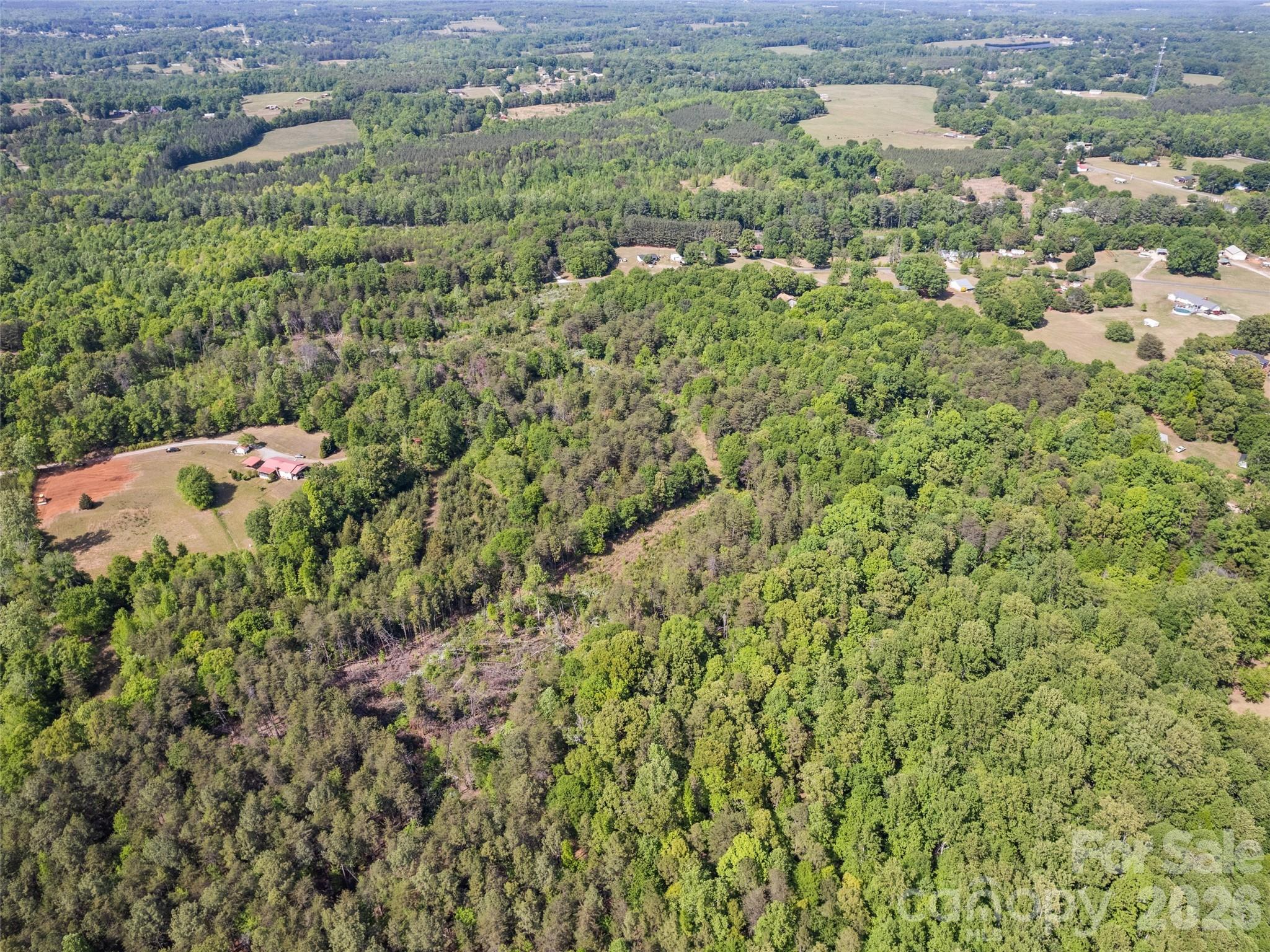 311 Soco Gap Road Ellenboro, NC 28040 - Photo 21 of 24 an aerial view of a house with a yard