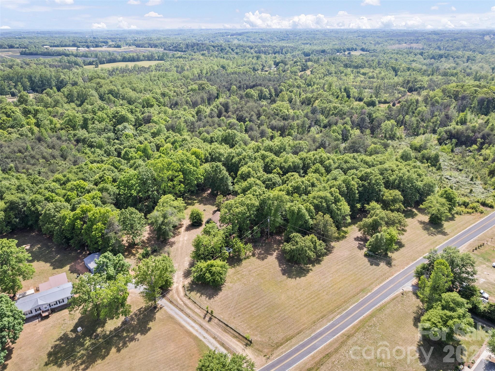 311 Soco Gap Road Ellenboro, NC 28040 - Photo 24 of 24 an aerial view of a house with a yard