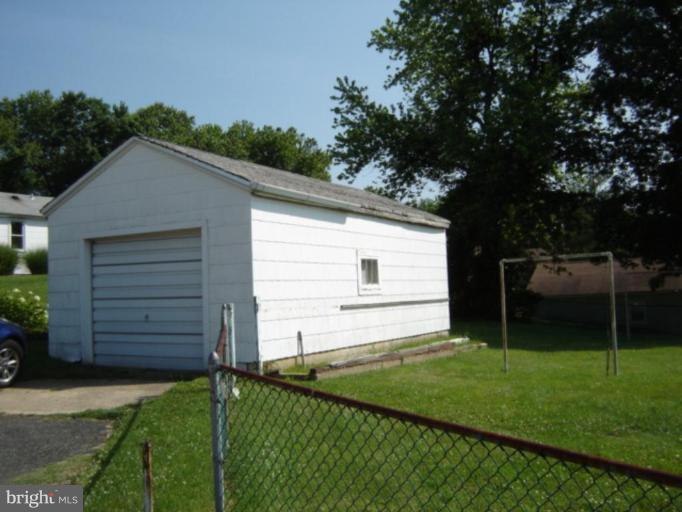 8004 Philadelphia Road Rosedale, MD 21237 - Photo 2 of 2 a view of an house with backyard space and garden