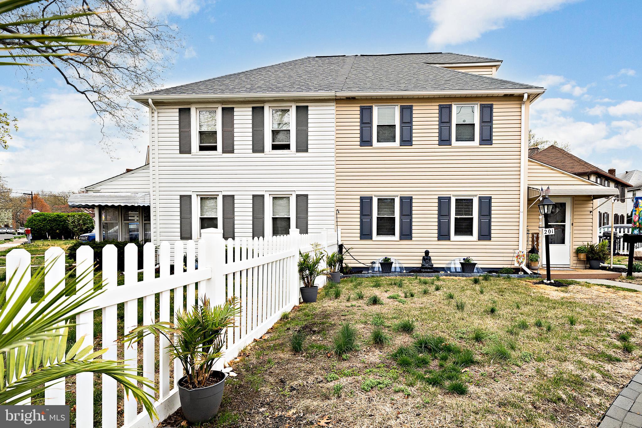201 Pennsylvania Road Brooklawn, NJ 08030 - Photo 3 of 45 a front view of a house with a lots of windows
