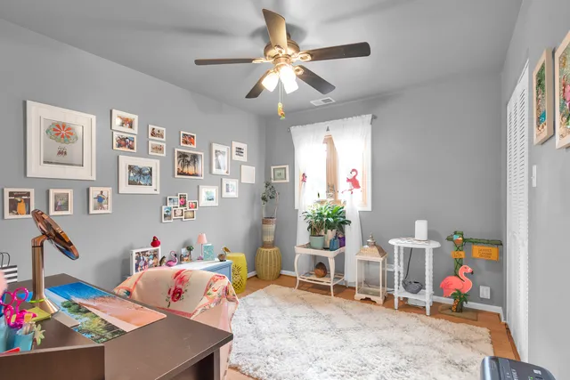 a bed room with a bed and a window