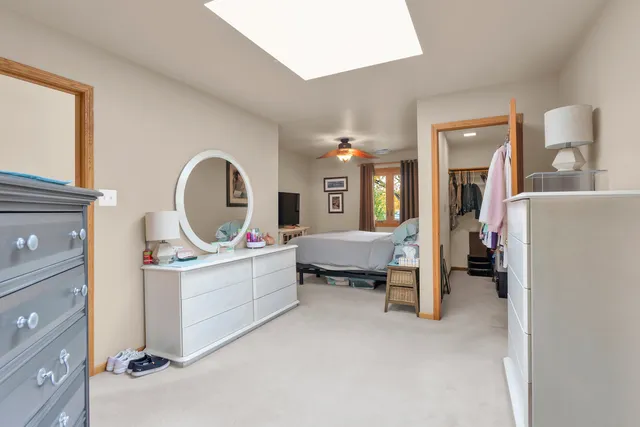 a small space with wooden fence and deck