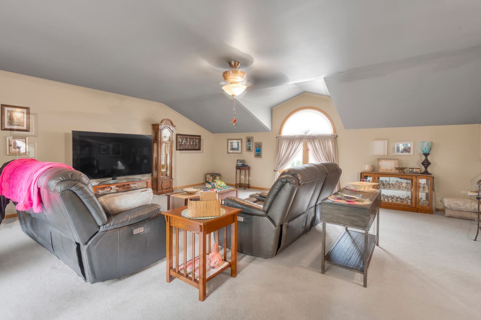 6528 Ridge Drive Chicago Ridge, IL 60415 - Photo 19 of 33 a living room with furniture a flat screen tv and a fireplace
